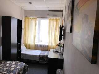 Гостиница Мини-отель Линдсей Москва Двухместный номер с 2 отдельными кроватями и ванной комнатой-1